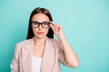 Close-up portrait of her she nice-looking attractive lovely lovable winsome content straight-haired lady touching specs isolated over bright vivid shine blue green teal turquoise background