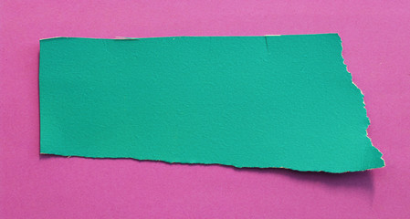 pieces of torn color paper texture background, copy space.