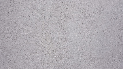 Abstract background of a flat gray wall or ceiling, neutral and neat backdrop with drywall texture and copy space