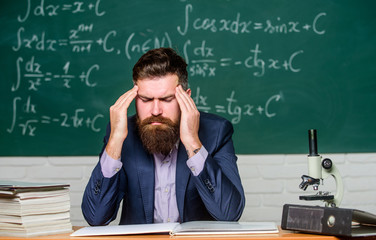 Terrible headache. Teacher has headache. Bearded man suffer from headache. Headache and migraine....