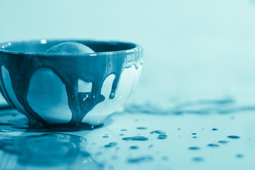 Decoration with blue paint in a bowl