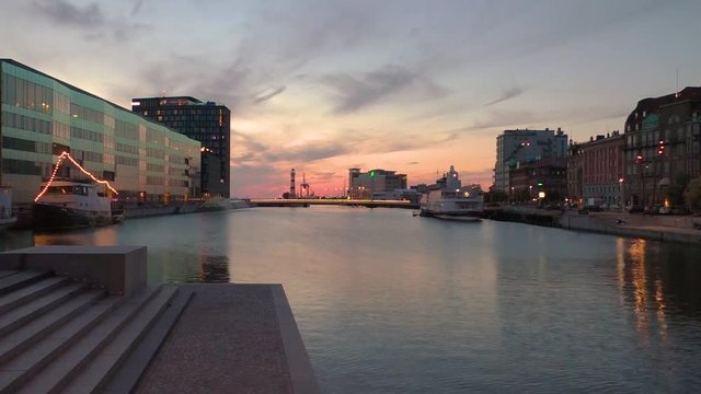 Cityscape time lapse video of Malmo, Sweden at sunset