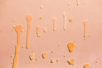 Top view splash paint on orange wall