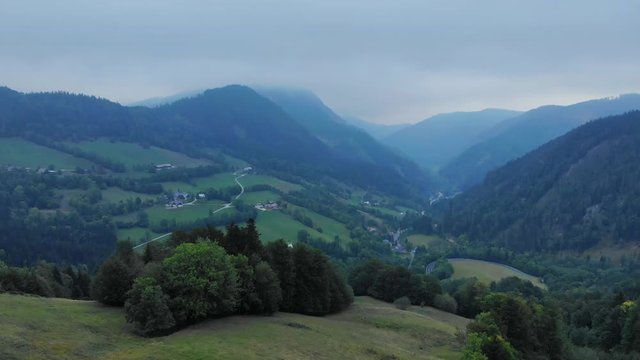 Beautiful drone footage of a valley near Annaberg, Austria on a foggy summer morning.