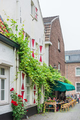 Fototapeta na wymiar MAASTRICHT, THE NETHERLANDS - june 10, 2018: Restaurants in Maastricht, Netherlands.