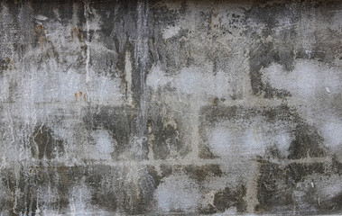 Wall grunge brick black and white gray background. Monochrome abstract texture The condition is old and worn down. The color of the brick gives an atmosphere of sadness. Indicate the emotions lament.