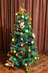 Christmas toys and ornaments on the Christmas tree