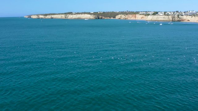 Drone aerial ff Albufeira cliffs, Algarve coast, Portugal