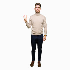 Fototapeta premium Young handsome business man wearing glasses showing and pointing up with fingers number three while smiling confident and happy.