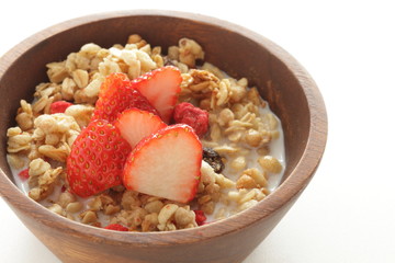 Healthy breakfast, granola in wooden bowl