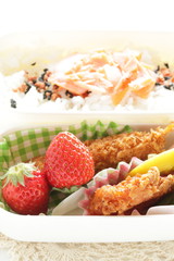 Japanese bento packs lunch, salmon and rice with cutlet