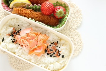 Japanese bento packs lunch, salmon and rice with cutlet