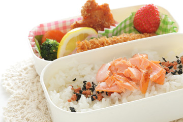 Japanese bento packs lunch, salmon and rice with cutlet