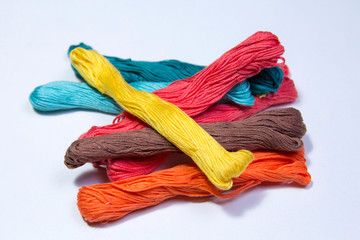 many embroidery flosses with background