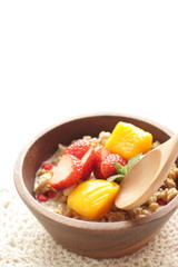 Healthy breakfast, granola mango and strawberry cereal and milk