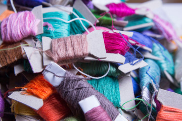 many embroidery flosses with background