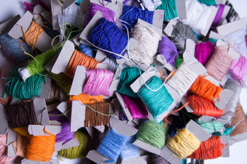 many embroidery flosses with background