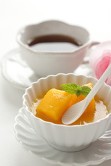 Gourmet dessert, tropical fruit  Mango and jelly