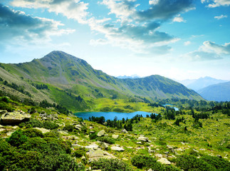 Fototapeta na wymiar Beautiful mountain landscape with lake in Neouvielle national nature reserve, French Pyrenees.
