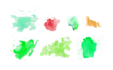 Set watercolor blots.Watercolor splashes and dots texture. Artistic hand drawn background.Green,blue,pink,yellow and red.