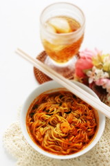 Asian instant noodles in white cup