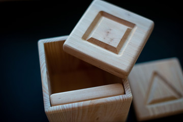wooden squares with geometric shapes