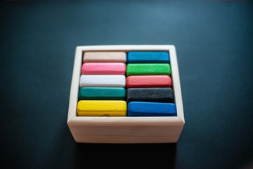 Fototapeta premium wooden squares with geometric shapes