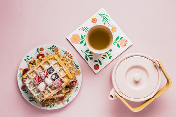 Breakfast with tea and waffles