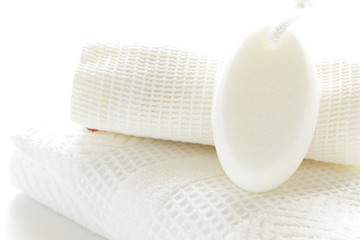 white towel and bathing stone for life style image