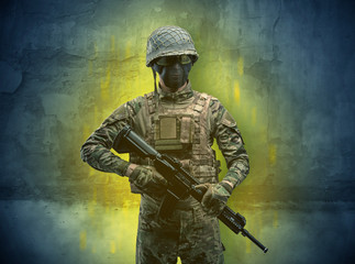 Hazard, menace soldier in a ruined crumbly building with arms on his hand