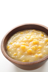 cream sweet corn in wooden bowl