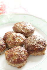 Homemade patty for burger cooking image