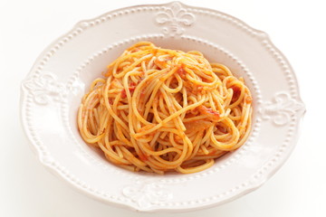 Homemade Italian cuisine, tomato spaghetti on white background