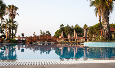 Fototapeta na wymiar View to a pool. Early morning. Summer. Kemer, Turkey.