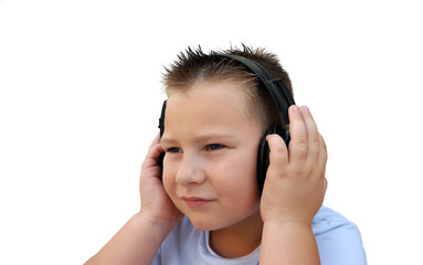 Fototapeta premium Cute little boy with in headphones listening to music