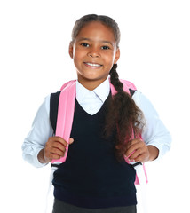 Happy African-American girl in school uniform on white background