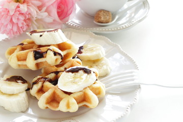 Belgium waffle and banana for breakfast image