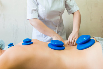 The concept of restoring health. Comprehensive body massage to restore strength and relieve fatigue in the Spa.