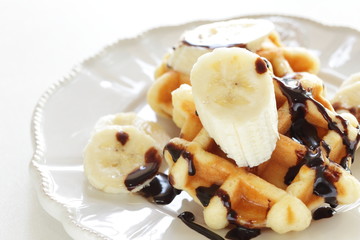 Belgium waffle and banana for breakfast image