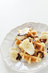 Belgium waffle and banana for breakfast image