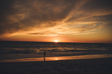 Naklejka na ściany i meble Sunset in Malibu Beach, USA