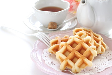 Waffle on wooden plate for gourmet dessert