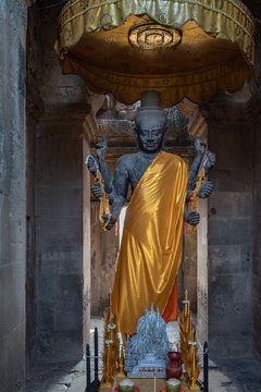 Huge Vishnu statue at the entrance of Angkor Wat temple, Siem Reap, Cambodia