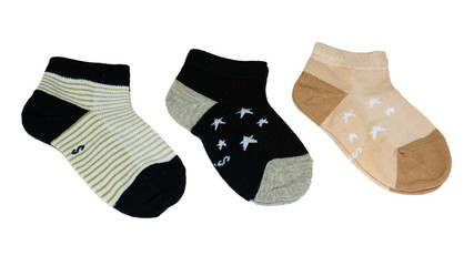 Three pairs of cotton socks. Striped pattern and star pattern. Children's socks. Cotton. Isolated item
