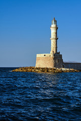 Historic Lighthouse in the old port in the evening, Chania, Crete.