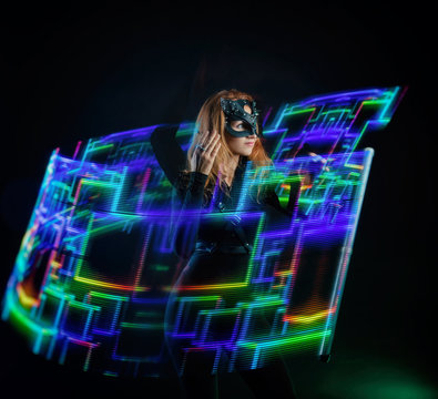 Pixel light show dancing girl in a cat costume for Halloween freezelight