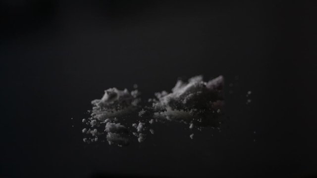 Cocaine being cut into lines