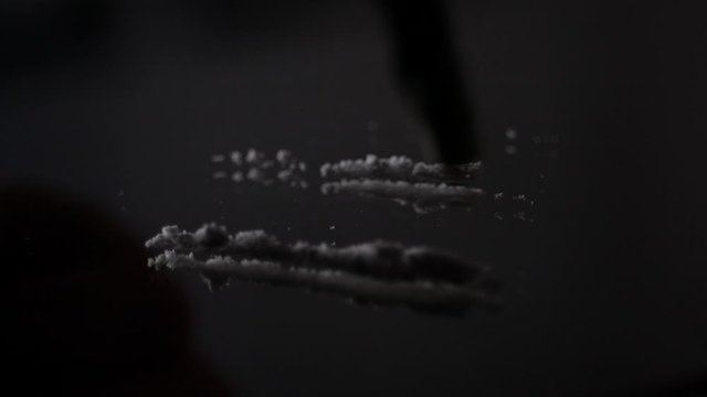 Cocaine being snorted off mirror macro