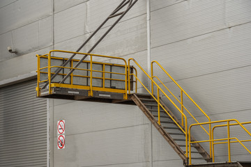 fire safety elements on the wall of an industrial building