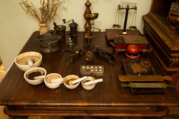 bottles and jars of medicine in an old pharmacy